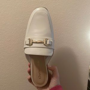 White mules with gold